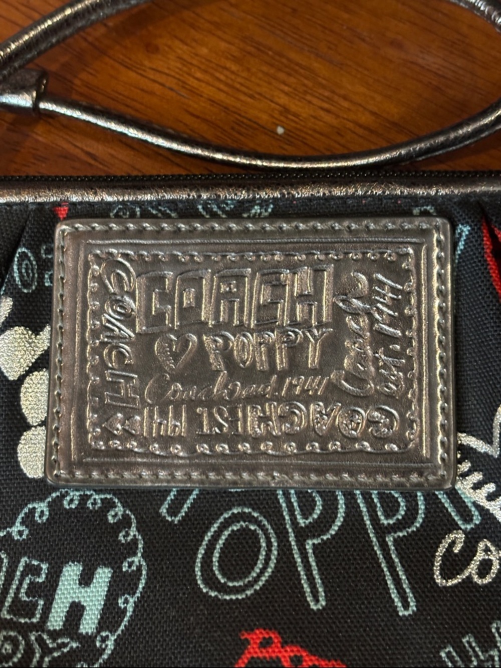 Coach Black Poppy Print Wristlet with Red & Light Blue Accents - Picture 3 of 6